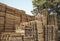 Piles of cargo pallets at a recycling business area , Can be used as a background