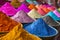 Piles of colorful powder paint ready for the indian Holi festival