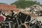 Piles Of Discarded Office Chairs And Debris At Demolition Site