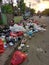 Piles of garbage scattered on the street