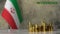 Piles of gold coins on a marble table against the background of the flag of Iraq.