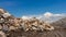 Piles of granite cloudy skies.