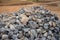 Piles of gravel limestone rocks on construction site. Break stones.