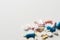 Piles of pills and capsule on white background, isolated. Selective focus. Copy space for text
