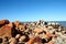 Piles of rocks next to ocean shore in Australia