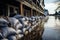 Piles of sandbags on a flooded street during a flood, Flood Protection Sandbags with flooded homes in the background, AI Generated