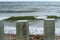 Piles on the sea coast, the construction of the promenade on the sea shore