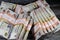 Piles and Stacks of Egypt money thousands of Pounds currency banknotes bills of 200 EGP LE, Egyptian money exchange rate and