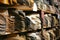 Piles of western american hats in rows