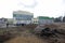 Piles of wood and wood chips which are used by the biggest in Ukraine boiler-house as biofuel. Slavutich, Ukraine