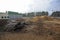 Piles of wood and wood chips which are used by the biggest in Ukraine boiler-house as biofuel. Slavutich, Ukraine