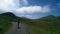 Pilgrim walking in the Pyrenees mountains on the way of St James.