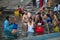 Pilgrims plunge into the water holy Ganges river in the early morning.