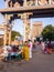 Pilgrims and vendors outside the entrance gopuram tower of the ancient Hindu