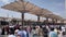 Pilgrims walk underneath giant umbrellas at Nabawi Mosque compound