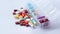 Pill box daily take a medicine, with colorful of pills, tablets, and capsules. Drugs use for treatment and cure the disease.