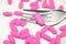 Pill of love on a fork. Pink pill