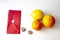 Pill on a red serviete, lemon, orange, mandarin orange and organ