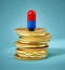 Pill standing on generic coin pile. 3D illustration