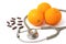 Pill and stethoscope with orange