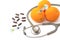 Pill,stethoscope,syringe with orange