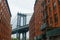 Pillar of Manhattan Bridge from alley in Dumbo district in Brooklyn