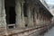 Pillared cloisters or prakara in the second courtyard, Virupaksha Temple, Hampi, karnataka. Sacred Center. View from the east. A s