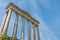 Pillars of the ancient Saturn Temple on the blue sky