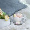 Pillow, a cup of coffee, flowers, Marshmallow Still life, layout on the bed.