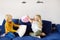 Pillow fight. Brother and sister play together. Active games for siblings at home
