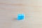 Pills blue On wooden floor with copy space