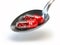 Pills with iron FE ferrum element in spoon. Dietary supplements.