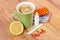 Pills, nose drops and hot tea with lemon for colds, treatment of flu and runny