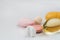 Pills in a row, various forms, white background. Multi-colored pills close-up and copy space