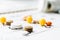 Pills, supplements and medicines for the disease. A pile of different pills on a calendar background