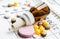 Pills, supplements and medicines for the disease. A pile of various pills and a bottle of therapeutic drops in a bottle on a