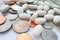 Pills, tablets and capsules with American coins on dollar usa background