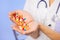 Pills, tablets and drugs pouring in doctor\'s hands