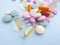 Pills vitamins  colored background