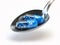 Pills with zinc Zn element in the spoon. Dietary supplements.