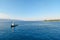 A pilot boat approaches a cruise ship at sea as it nears the island of Corfu Greece, in the Ionian Sea