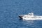 Pilot Boat Cutting Across Blue Water