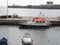 Pilot boats used to guide cruise ships into the harbor moored on the jetty at funchal