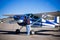 Pilot doing preflight of light aircraft