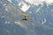 Pilot flying foot launched Hang glider with Zillertal Alps mount