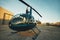 Pilot inspecting the rotor blades of a helicopter