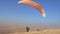 The pilot turned 180 degrees to keep the paraglider in the air