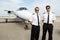 Pilots Standing In Front Of Private Jet