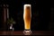 pilsner beer in a tall, slender glass, light behind it