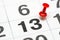Pin on the date number 13. The thirteen day of the month is marked with a red thumbtack. Pin on calendar